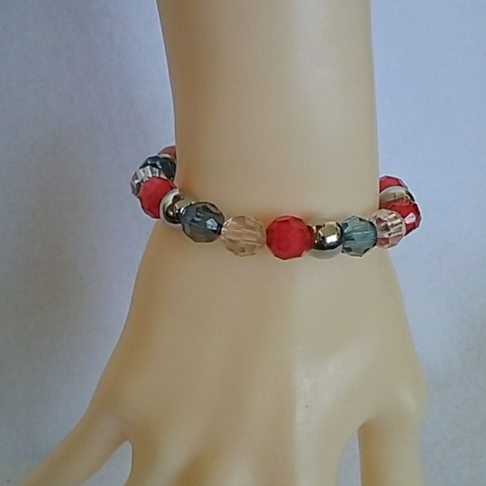 Red, clear, and blue beaded stretch bracelet